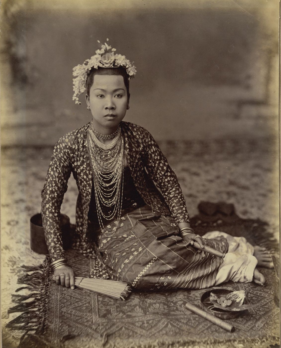 Philip Adolphe Klier, “Burmese Woman with Fan and Cigar”, 1880 ca.